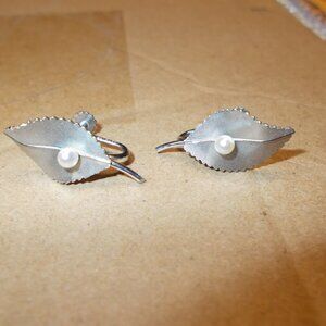 Vintage Krementz silver-tone screw-back type earrings with faux pearl center